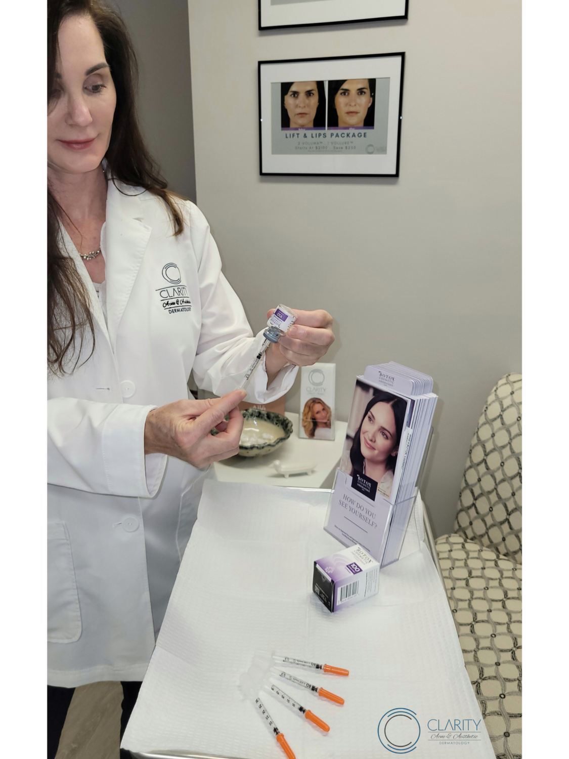 Practitioner preparing injectable treatment in clinic.