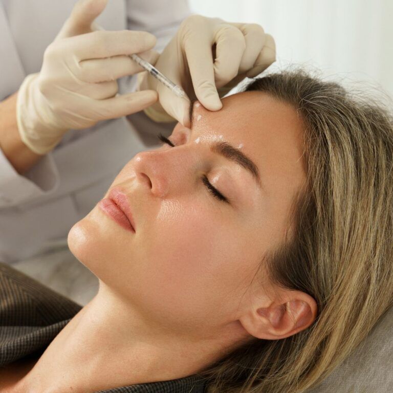Patient receiving cosmetic injection treatment.