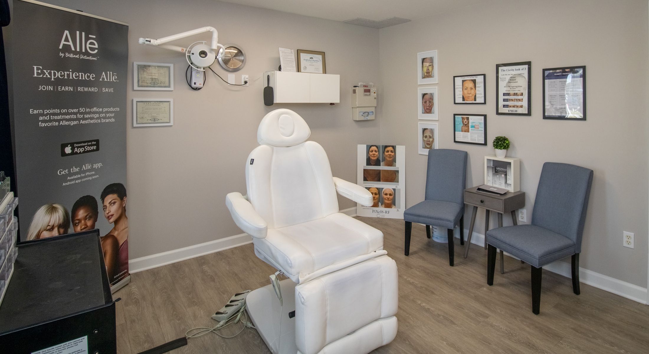 Aesthetic treatment room with chair and decor.