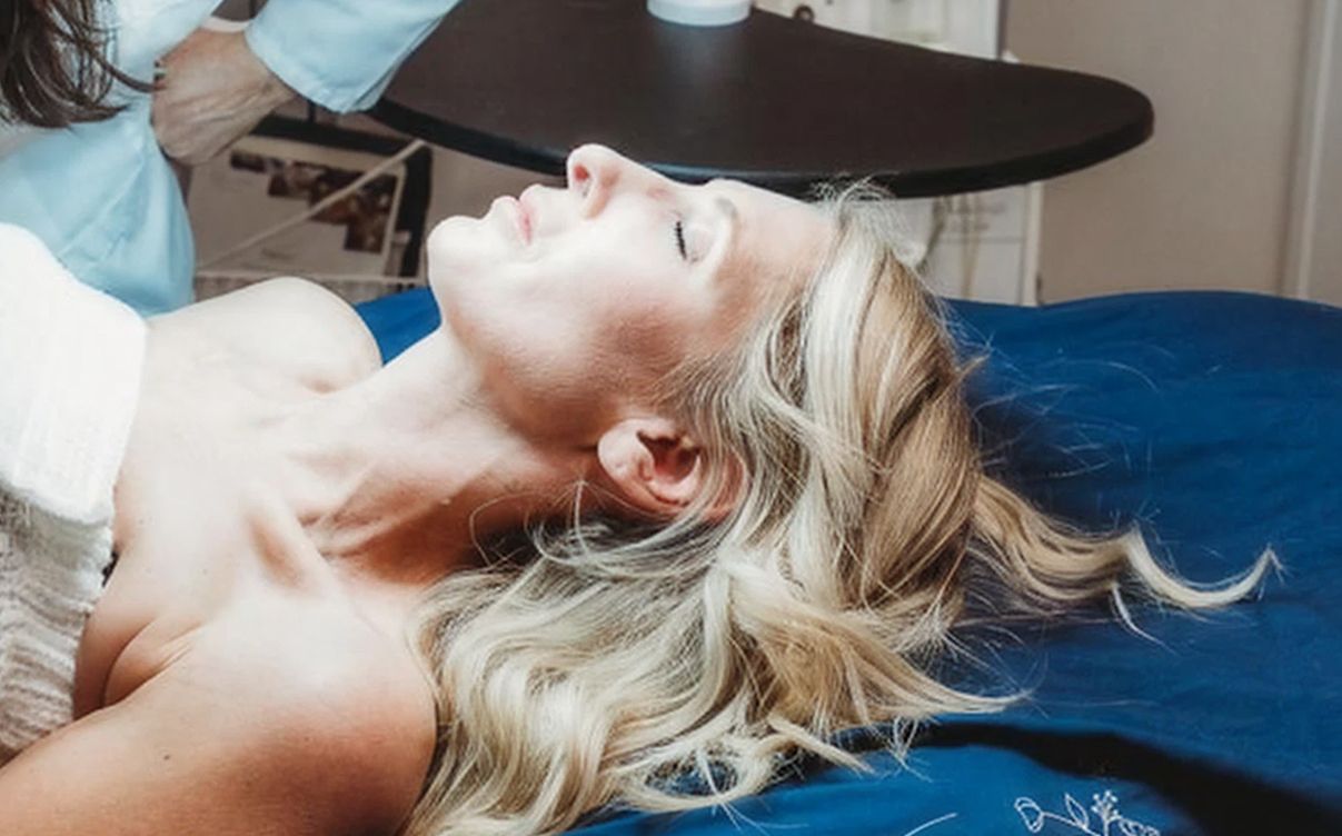 Woman relaxing during a beauty treatment session.