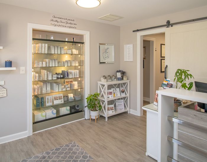Spa interior with product display and reception area.
