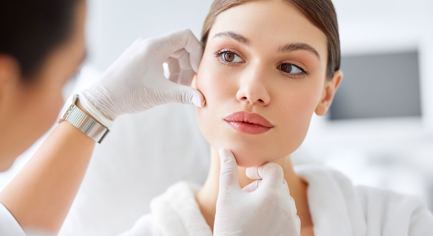 Consultation for facial skincare treatment.